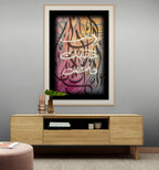 Destined — مكتوب in a natural wood frame above a sideboard in a modern living room | ENJZ