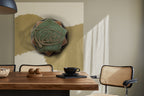 Contemporary Arabic poetry art print above wooden dining table in neutral interior — original work by Lebanese artist Zein Sourany